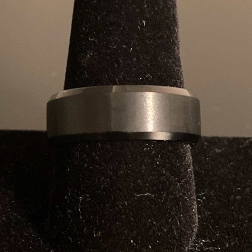Black/silver tone ring. Size 10.5